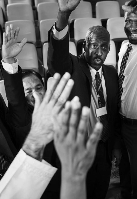 Group of International Business People Raising Their Hands